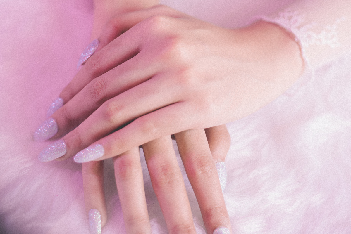 Woman with Sparkly Nails